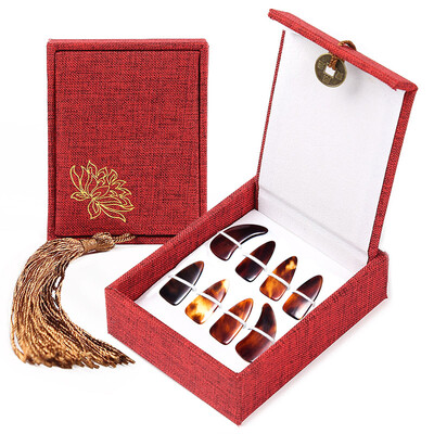

Jingdong Supermarket Acacia Bird LOVEBIRD Guzheng Nail Adult Child Nail Beginner Practice Musical Instrument Accessories Double-sided Thickening Section 8 Pack XS1034 Medium