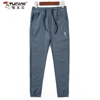 

Woodpecker (TUCANO) Wei pants men summer casual fashion pants thin section of the foot pants male pants men 17095ZMCK01 dark gray 3XL
