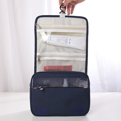

The man washes the bags and bags the ladies' makeup bag