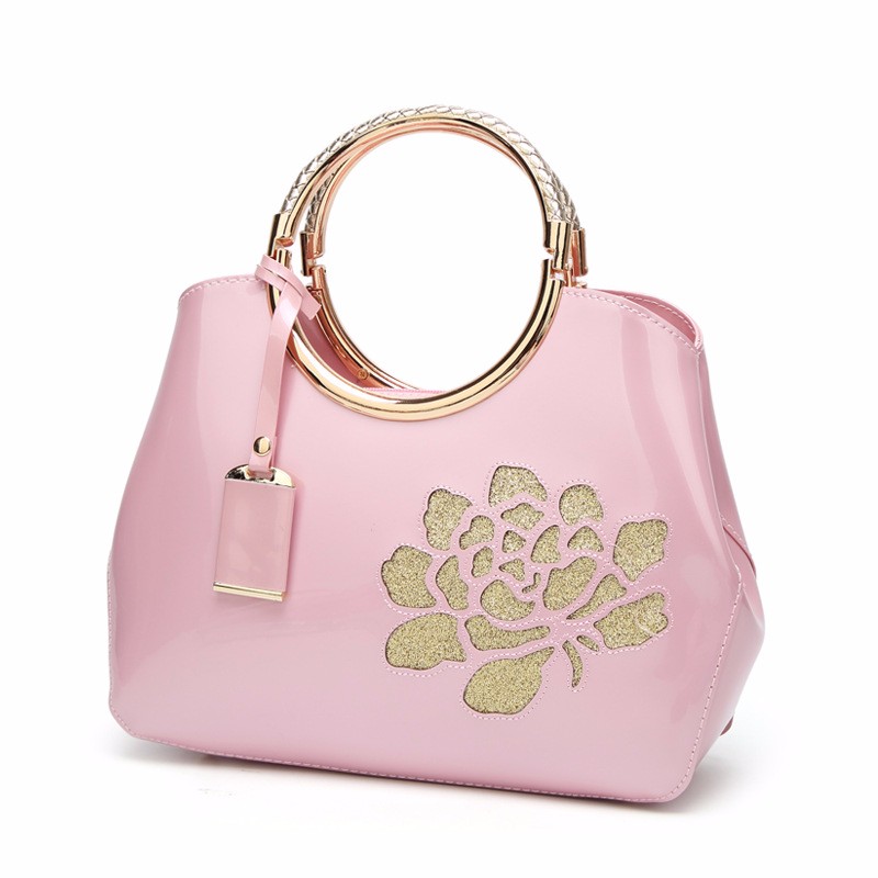 

CAROLING ANGEL розовый 28 15 22см, Женская кожаная сумочка Известные бренды Яркая сумка для диких наплечных сумок