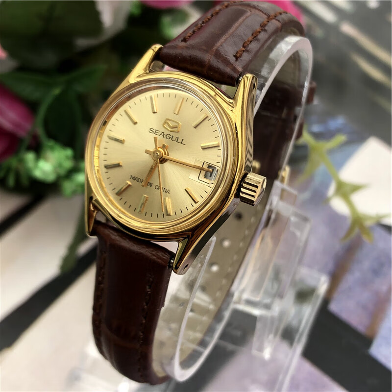 90年代全新库存海鸥手动机械女表表复古白钢圆形日历经典收藏真皮