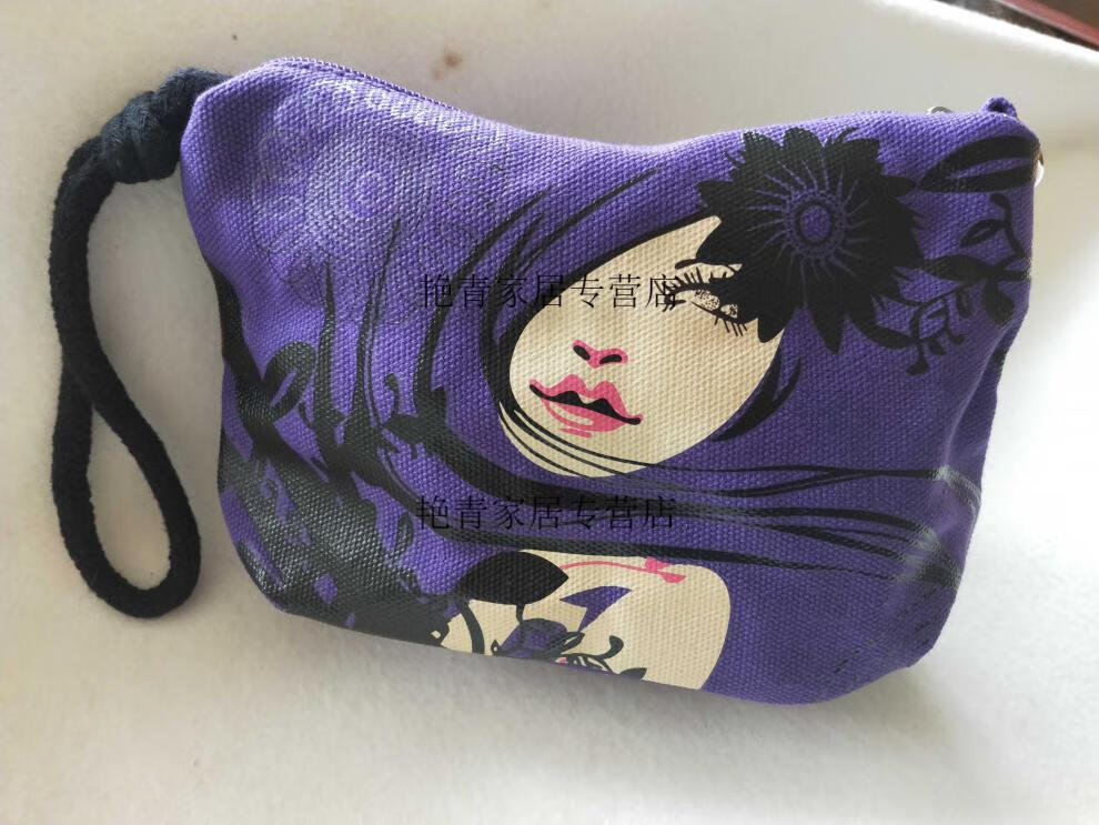 印花迷你化妆包手拿包新款时尚黑眼睛女包帆布多用包化妆包斜挎单肩