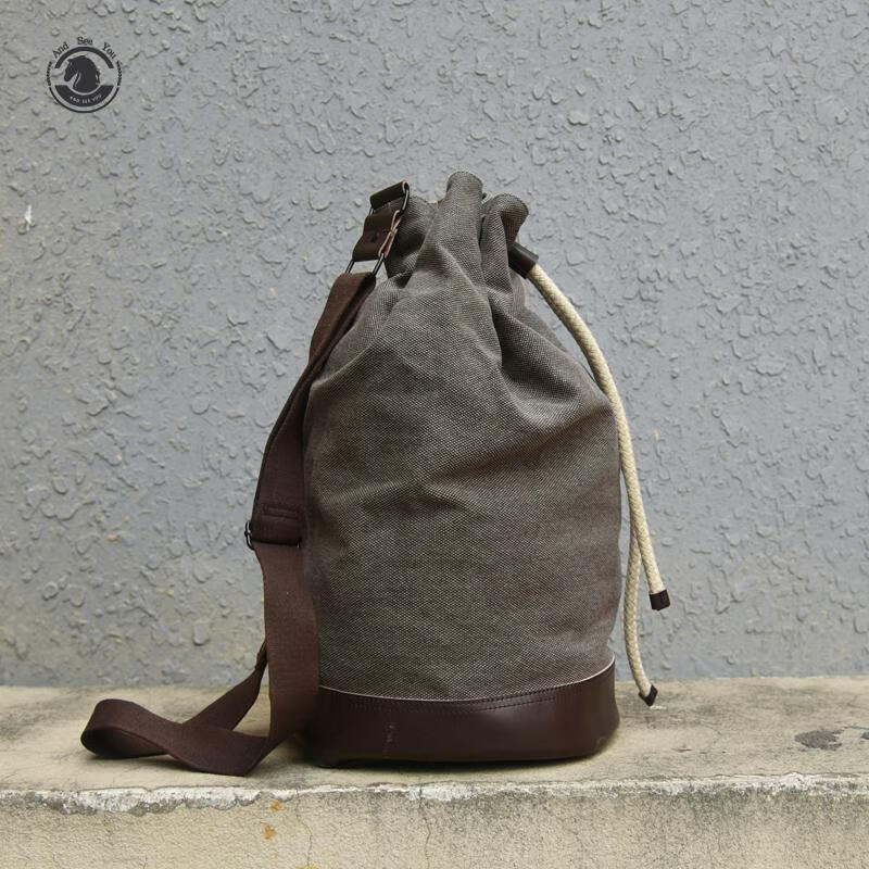 andseeyou品牌 单肩包男 时尚帆布圆筒包 复古运动健身包 大容量旅行