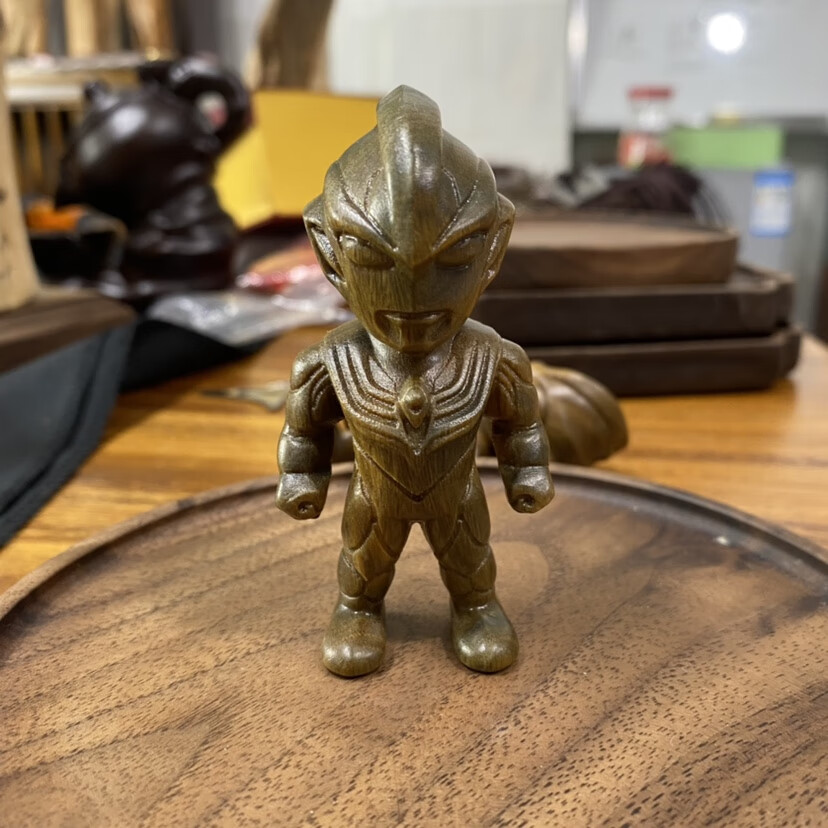 阿根廷绿檀木雕 阿根廷绿檀木迪迦银河奥特曼手把件莆田木雕摆件实木