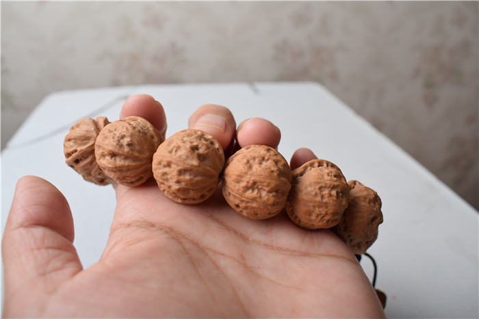 南疆石文玩核桃文玩核桃野生黄杆狮子头手串麻核桃把玩核桃手持精品