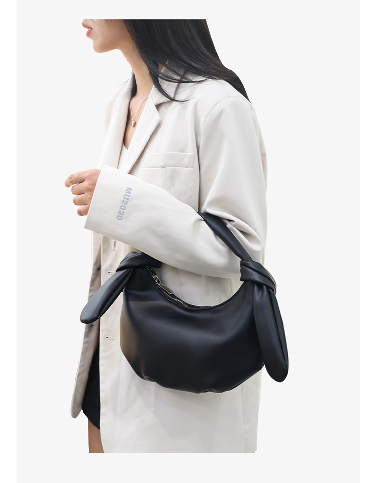 奢曼妮品牌女包饺子包个性新款时尚百搭兔耳朵月牙包通勤手提斜挎包