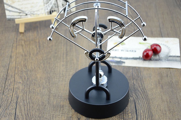 永动摆件金属永动仪牛顿摆创意海豚旋转电磁摇摆器办公室装饰摆件生日