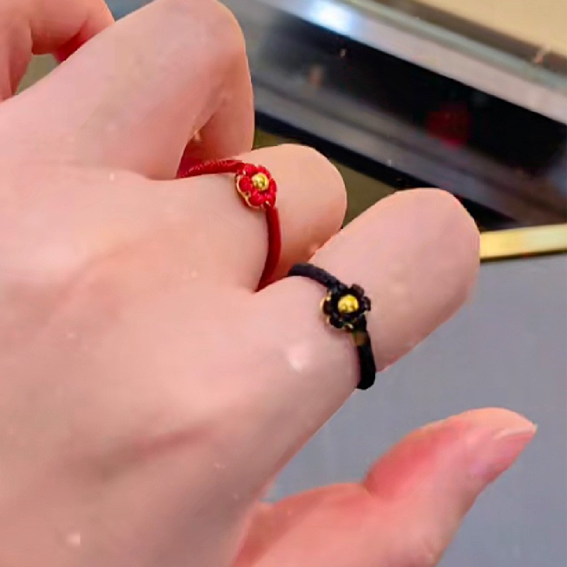易升一路生花黄金戒指女999足金转运珠本命年红绳编织小红花食指指环