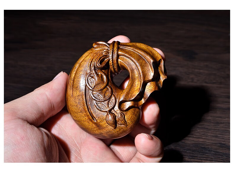 豪珠金丝楠木钱袋手把件原木色摆件阴沉木手工雕刻把玩件车挂件图片色