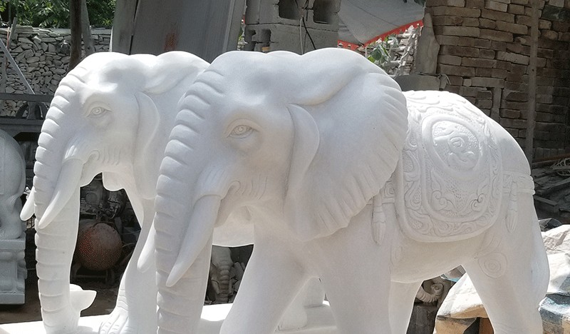 2021新品石雕大象一对象家用汉白玉招财摆件大理石晚霞红石象看门