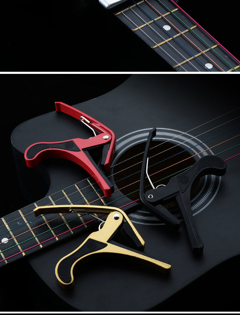 00g店铺:郸倩乐器专营店商品编号:10030614535954商品名称:吉他变调夹
