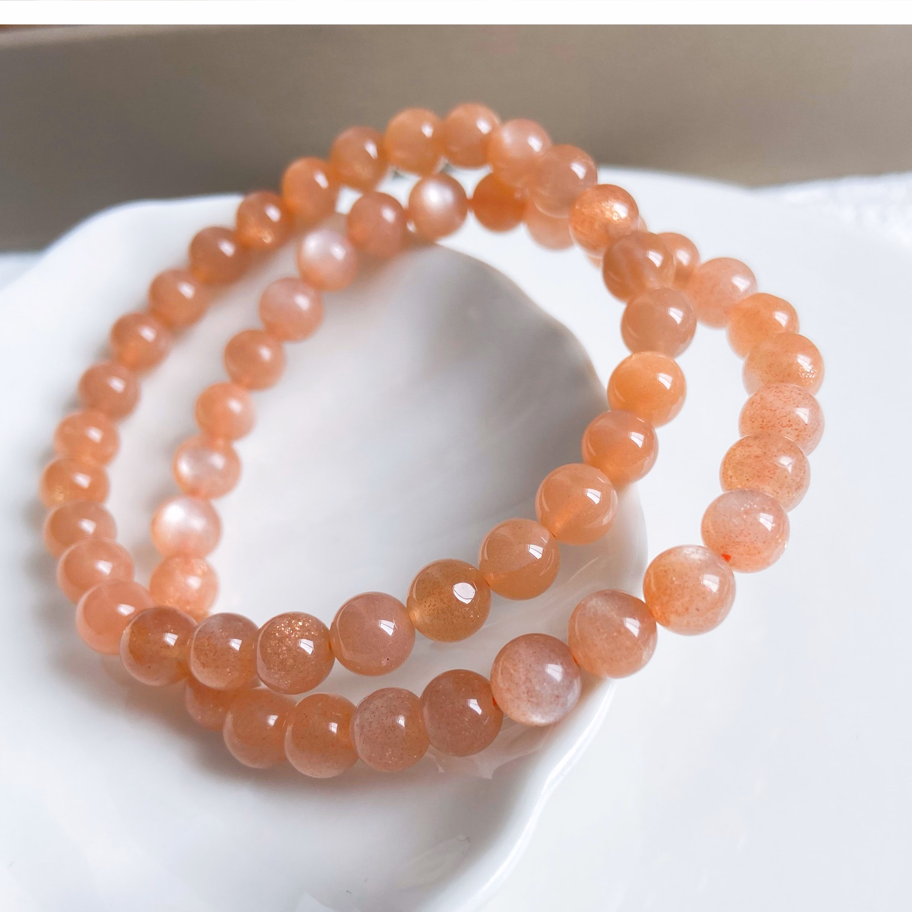 60高档好看巴西金沙太阳石水晶手链单圈手串男女款猫眼简约橙月光