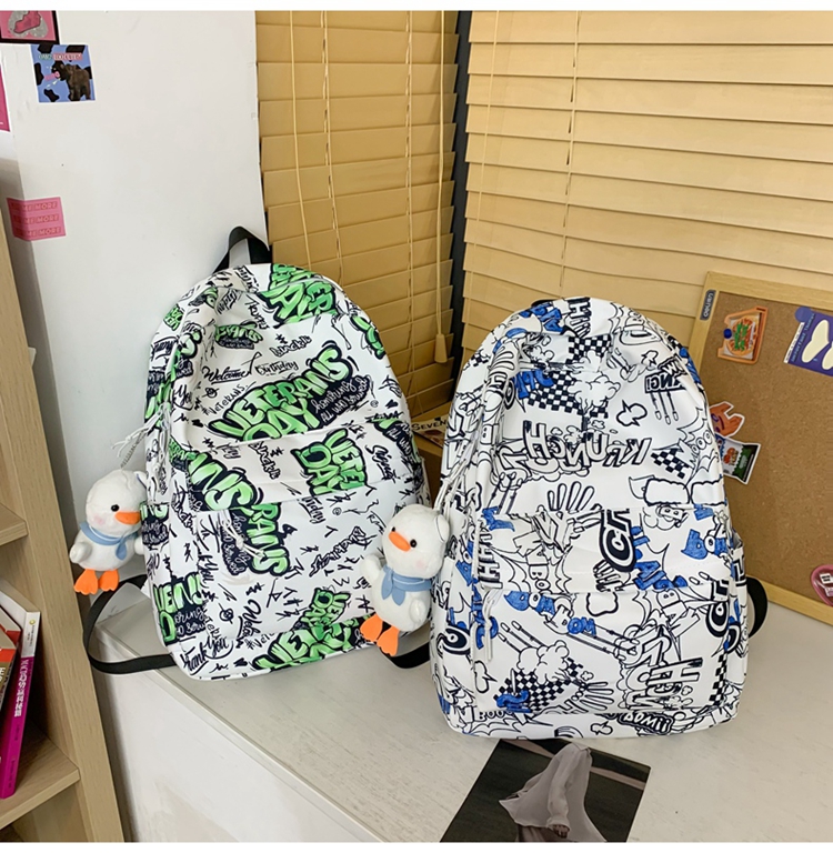 潮牌涂鸦书包女大学生ins原宿卡通印花双肩包男中学生大容量背包涂鸦
