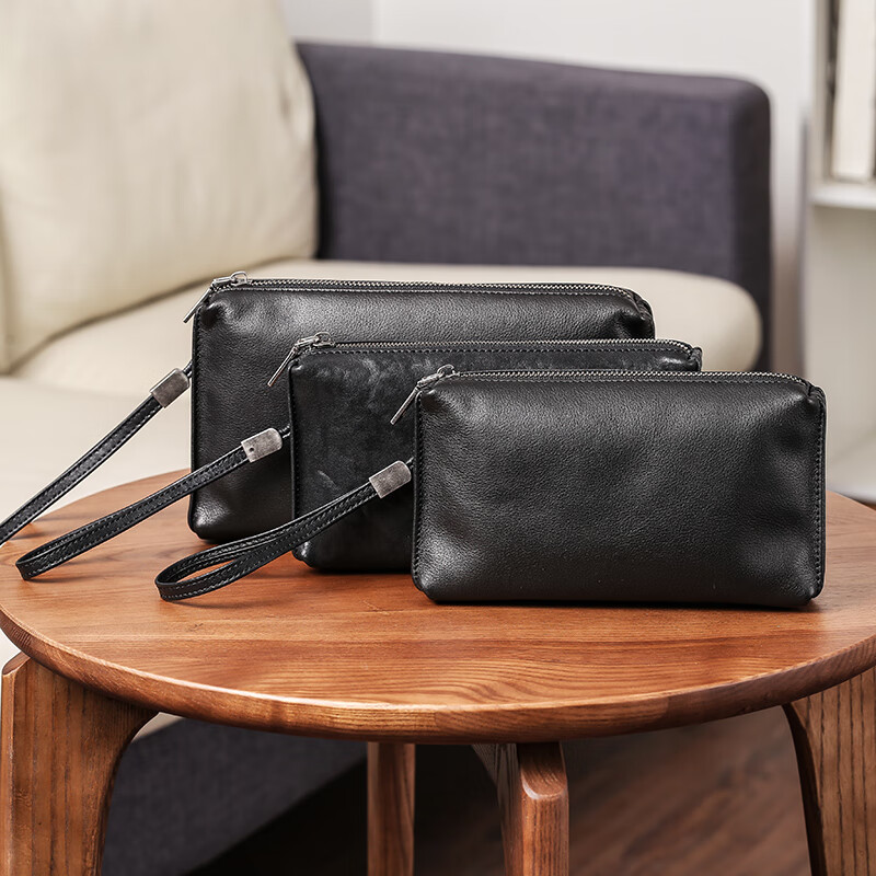 新款头层牛皮时尚小手包男复古休闲男士手机包真皮植鞣皮男士手包