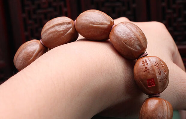 橄榄核素核手串男纯手工打磨老树铁核原皮原籽光珠苏工核雕橄榄胡手链