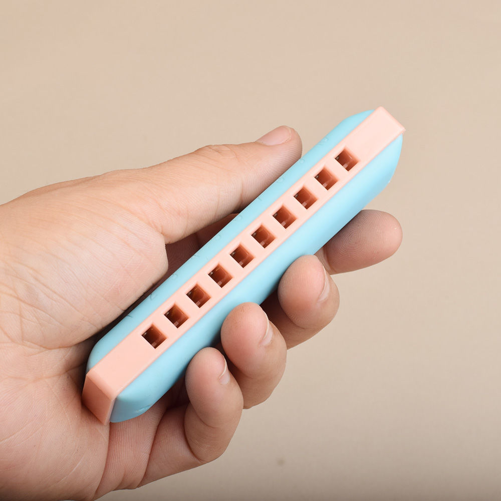 口琴10孔树脂初学口琴学生儿童入门男孩玩具便携塑料女孩小乐器粉白