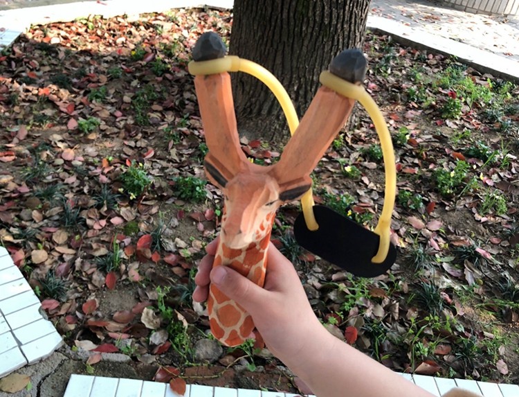 弹弓木制户外雕刻卡通动物玩具儿童礼品创意弹弓射击奥特曼泥丸200颗