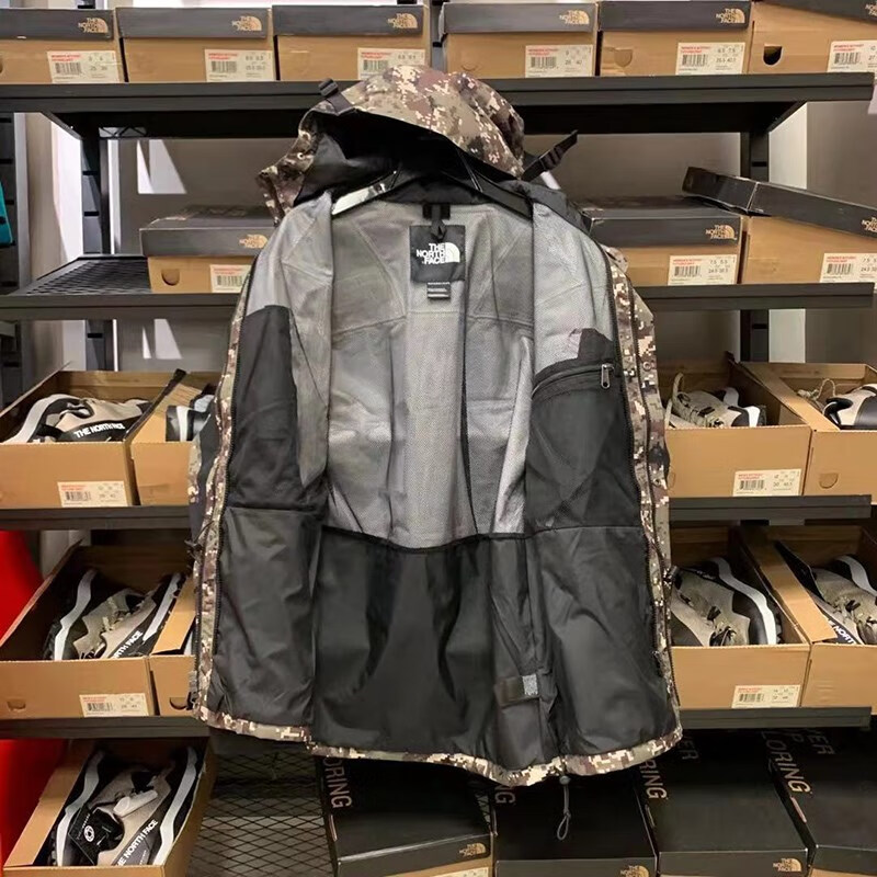 the north face 94北面男户外休闲连帽冲锋衣单层中长防风雨迷彩 nf0