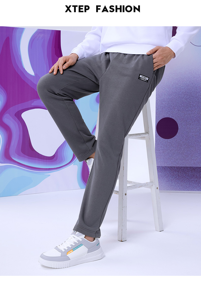 特步运动裤男裤休闲裤子男秋季新款卫裤针织长裤直筒休闲运动长裤男深