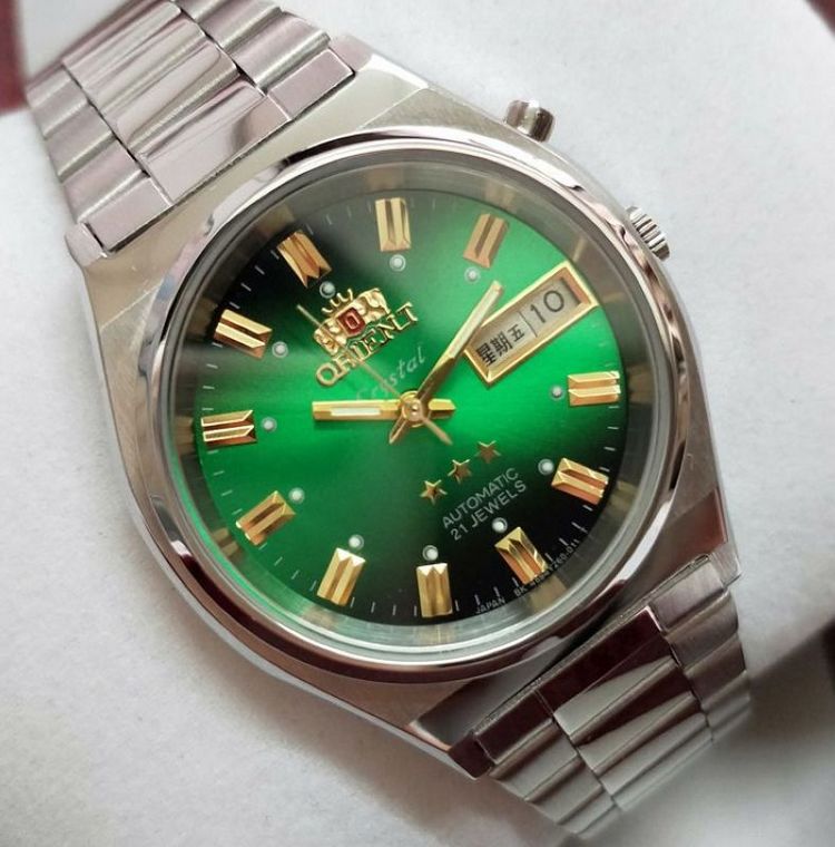 宓蝶库存老款东方双狮男表中老年全钢日本双狮三星手表全自动机械表