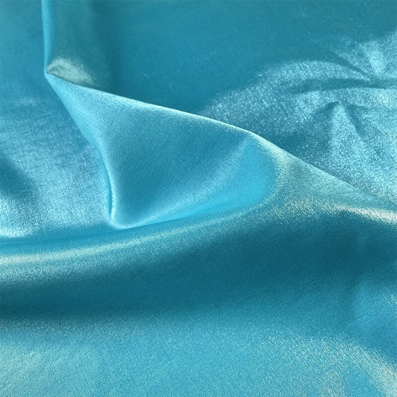 布艺岛 纯色色织冰蓝色光泽琉璃丝麻亚麻缎面面料 中国风礼服布料 冰