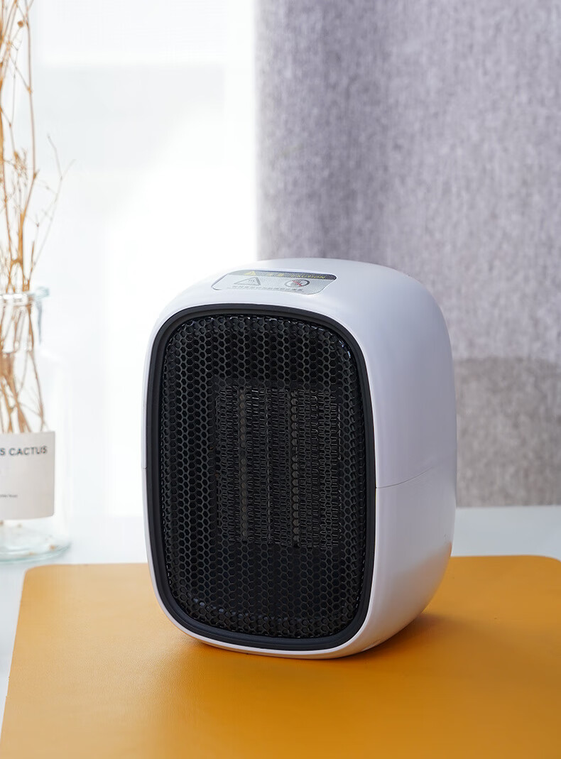 新圆小米冬天取暖器家用烤火器迷你暖风机小型节能室电暖气小太阳桌面