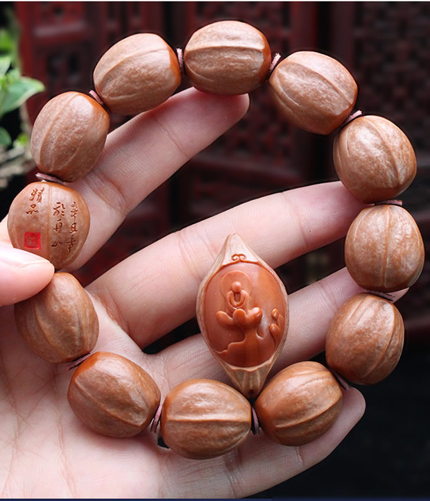 橄榄核素核手串男纯手工打磨老树铁核原皮原籽光珠苏工核雕橄榄胡手链