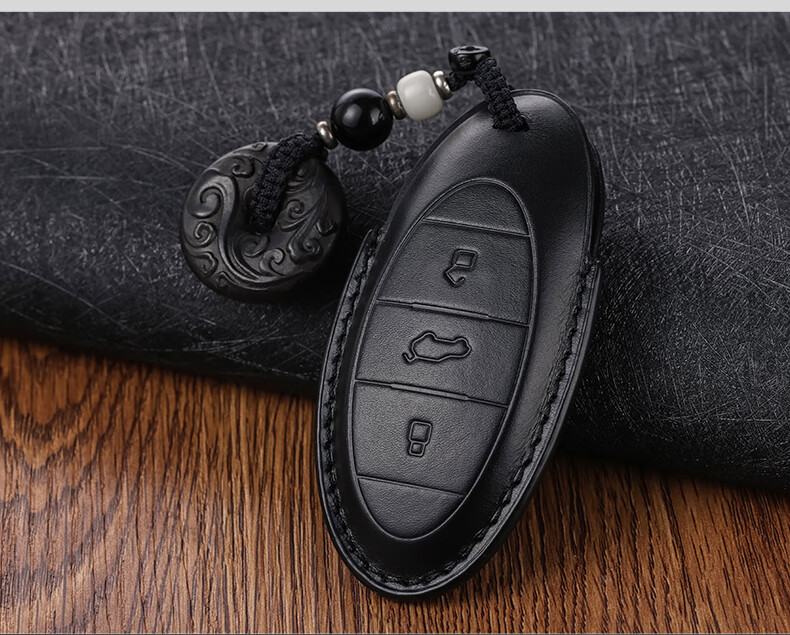 专用于一汽奔腾b70钥匙套b70se01t33t55t77t99nat汽车真皮钥匙包壳扣