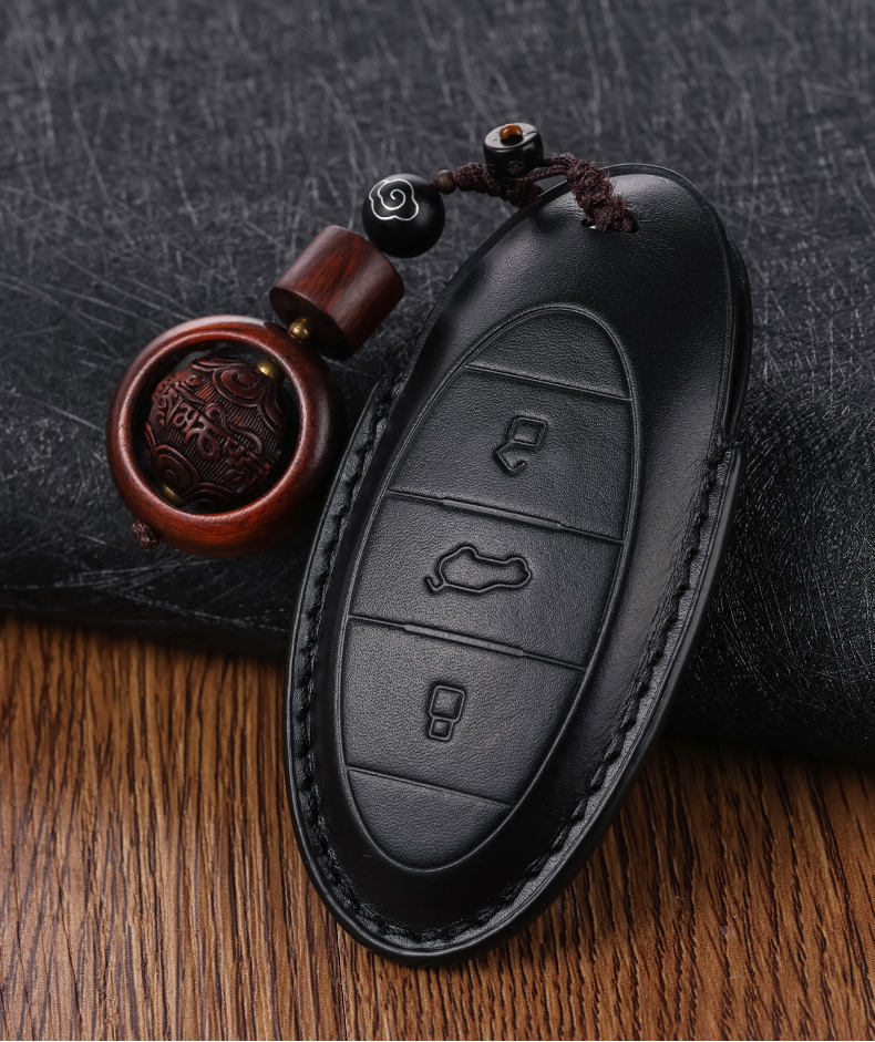 专用于一汽奔腾b70钥匙套b70se01t33t55t77t99nat汽车真皮钥匙包壳扣