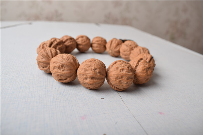 南疆石文玩核桃文玩核桃野生黄杆狮子头手串麻核桃把玩核桃手持精品