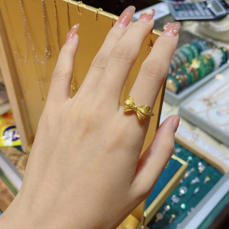 老凤凰送证书黄金蝴蝶结戒指女迪士尼在逃公主戒指999足金网红麻花
