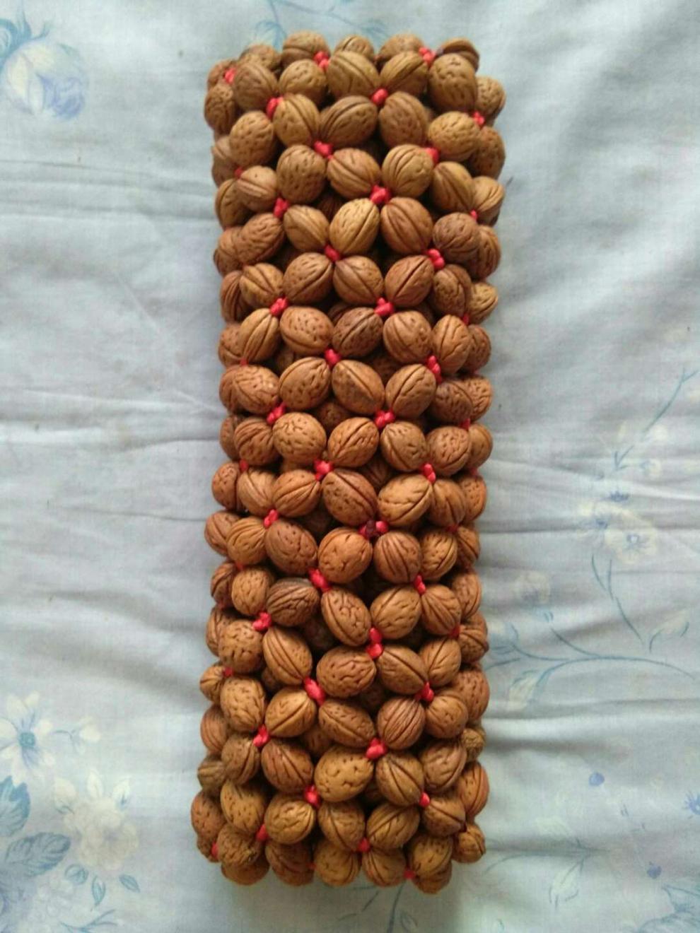 核桃枕头山核桃颈椎枕桃核纯手工编制缓解颈椎疼痛粉色套子