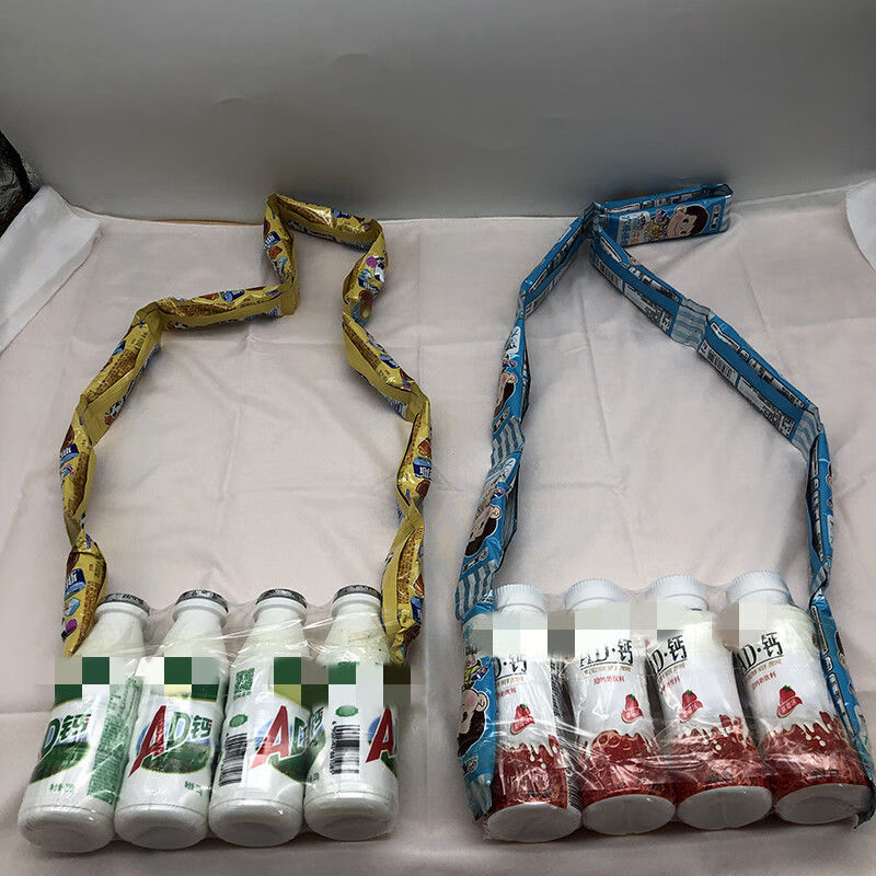 零食做的背包个包包阿尔卑斯不二家棒棒糖加ad钙奶旺仔牛奶连起来糖果