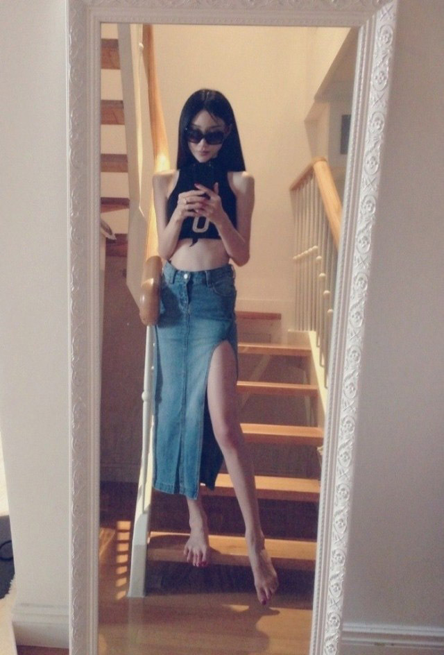 冬泉谷 韩版新款女开叉包臀裙显瘦中裙女半身裙牛仔裙一步裙长裙 浅蓝色 S码平时穿2526