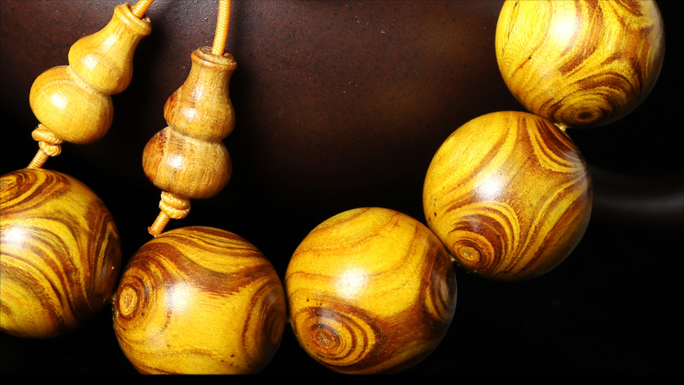 一生一木黄金柚木手串黄金柚对眼男款鬼脸金丝柚楠木黄金木小孔佛珠