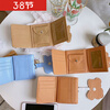 Baoya Korean ins simple and compact cartoon cute strawberry bear short wallet female student folding PU tri-fold card bag beige plaid with bear pendant