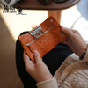 Kangaroo (KANGAROO) vegetable tanned cowhide wrinkled multifunctional genuine leather coin key bag mini large capacity zipper small key bag orange