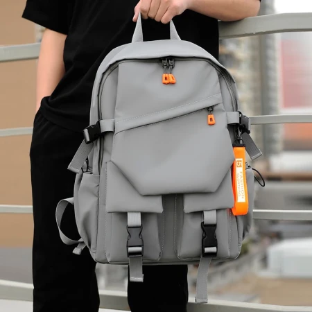 Huge riding backpack men's backpack large-capacity schoolbag college students junior high school student travel bag burden reduction multi-functional waterproof computer bag gray enlarged version [waterproof fabric]