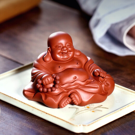 Yixing purple clay tea pet sculpture by famous pottery artist Fingertips Maitreya Buddha in a cloth bag Fully handmade tea play with little monks that can be raised and change color boutique Maitreya Buddha always smiles