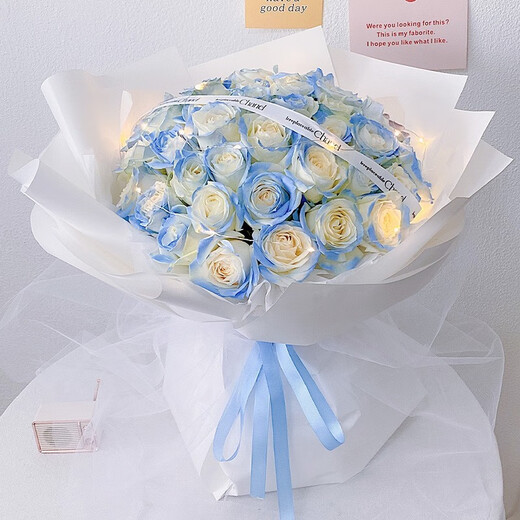 Eswina Flower Express delivers 11 rose bouquets as a birthday gift to your girlfriend nationwide and 33 crushed ice blue bouquets