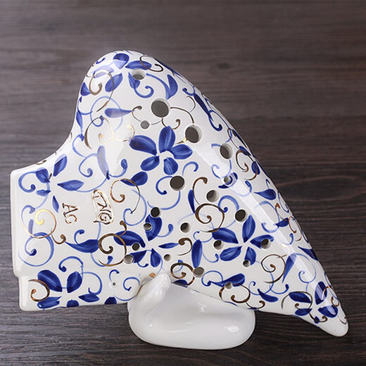 Taiwan tng ovale douze trous Mid-tone C ovale bleu et blanc en porcelaine or 12 trous à trois tuyaux Performance professionnelle Performance Flaste à quatre tuyaux