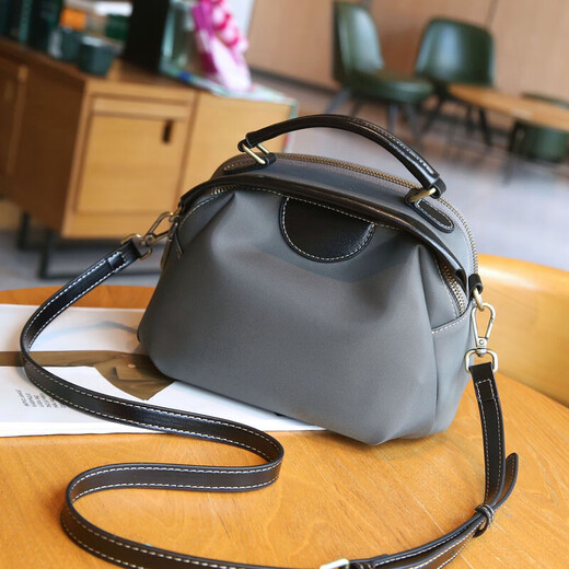 Gusennu mit Cowhide Einfacher Nylonbeutel One-Shoulder-Schalenbeutel wasserdichte leichte Oxford-Stoff-Cross-Body-Bag Frauenhandschelig-Knödel Beutel Haze Blau Blau