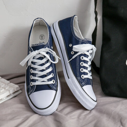Rote und grün hundertjährige Low-Top-Leinwandschuhe für Männer koreanischer Stil Klassiker vielseitiges Schwarzpaar Schüler Schnüre-up-Freizeitschuhe Sommer atmungsaktiv