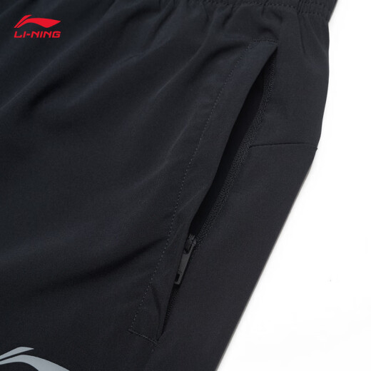 Li Ning Sports Shorts de secado rápido para hombres Corrientes de verano Fitness Entrenamiento de fitness Simple Sports Pants Fitness Clothing [Modelos de secado por secado 693] Black-1 S