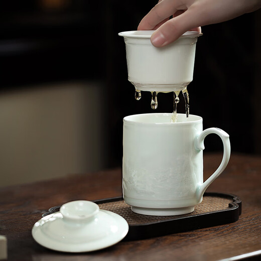 Gold inlaid jade teacher Huang Shouliang handmade Jingdezhen ceramic tea cup shadow green carved office tea cup Penglai Wonderland