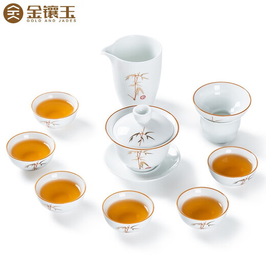 Gold inlaid jade ceramic kung fu tea set complete set of covered bowl teacup white porcelain household simple gift box high-end festival covered bowl set