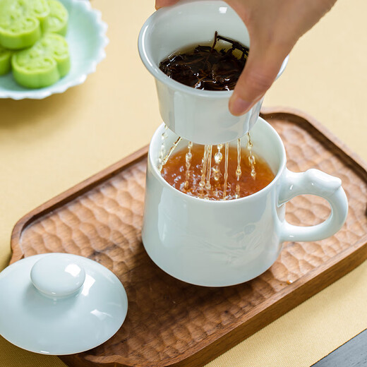 Changnan tea cup Jingdezhen ceramic carved tea water separation cup with lid tea set office cup faucet orchid