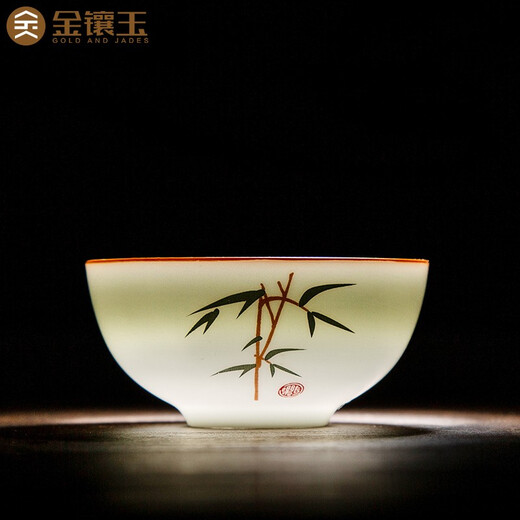 Gold inlaid jade ceramic kung fu tea set complete set of covered bowl teacup white porcelain household simple gift box high-end festival covered bowl set