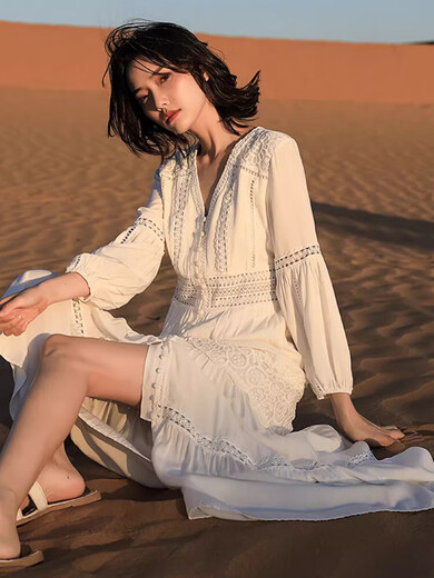 Huayuzhi white dress women's summer 2025 new high-end beach long skirt temperament small person pure long sleeves white long sleeve V-neck design hollow first love skirt M [Suggested 108-130Jin [Jin equals 0.5 kg]]
