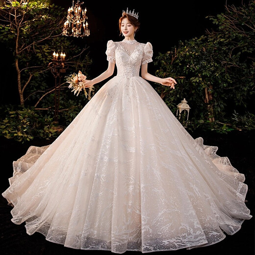 Robe de mariée de maquillage rouge 2025 Nouvelle mariée Princesse Puff Sleeve luxueuse Palace Style Tail Français Robe de mariée principale Light Champagne Slat S